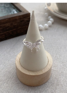 Detailed macro of 925 sterling silver butterfly ring with sparkling zirconia stones