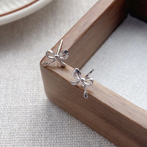 S925 sterling silver bow knot stud earrings for women with high-end polished finish