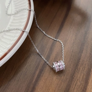 S925 sterling silver necklace with pink square-cut gemstones on a cylinder pendant