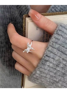 Detailed close-up of 925 sterling silver butterfly ring with intricate wing textures