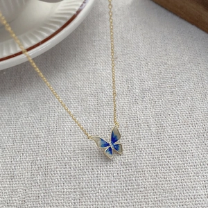 Elegant S925 sterling silver butterfly pendant necklace with blue enamel on gold chain