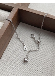 Macro-opname van S925 zilveren Chopin ketting met hartbedel en verstelbare schuifkraal