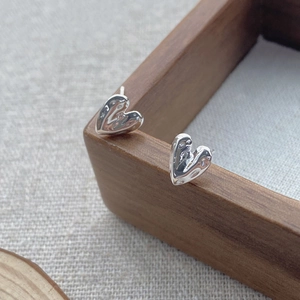 Handcrafted S999 sterling silver heart stud earrings with unique hammered texture design