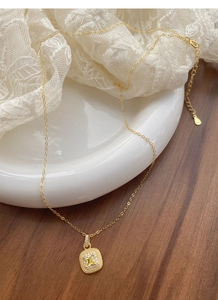 Detail of S925 sterling silver gold plated square yellow gem necklace with micro-pave crystals