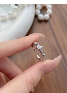 Close-up of elegant S925 sterling silver butterfly ring with sparkling zircon stones
