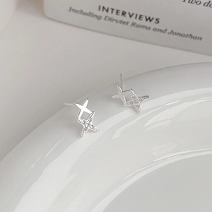 Minimalist S999 sterling silver four-pointed star stud earrings with sparkling diamonds