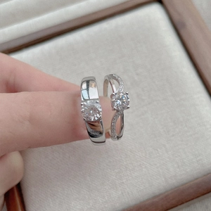 Classic S925 sterling silver four-prong diamond couple rings on a velvet box
