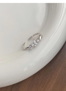 Detail shot of adjustable S925 silver ring featuring butterfly motif with white zircon