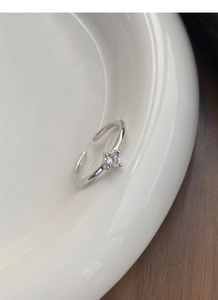 Detail of S925 sterling silver stamp and sparkling zircon inlay on the minimalist ring
