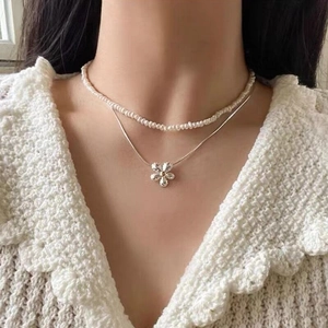 S925 sterling silver daisy necklace with a double-layered pearl and snake bone chain