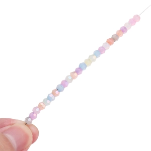 Macro shot of 4mm faceted glass beads in macaron colors for DIY jewelry making