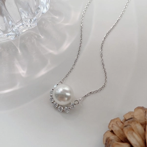 Elegant S925 silver necklace with a large round pearl and crescent zircon pendant