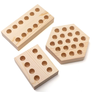 Pine wood storage blocks for pliers and essential oil bottles in three geometric shapes