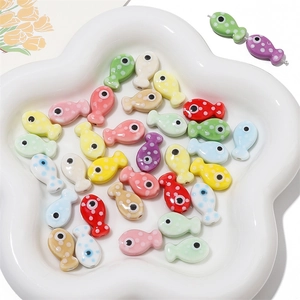 Colorful ceramic fish-shaped beads with polka dot patterns for DIY jewelry making