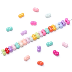 Colorful bowtie-shaped acrylic beads for DIY jewelry making in various vibrant colors