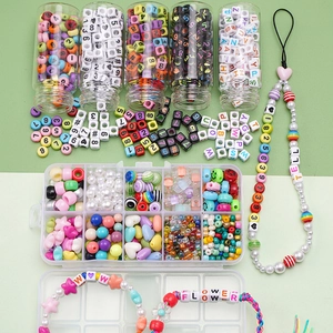 DIY handmade bead set with acrylic letters and colorful beads in a storage box