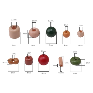 Assorted colorful glass beads in various shapes and sizes for DIY jewelry making
