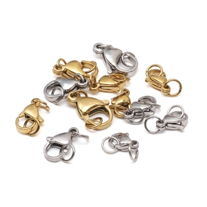 Macro detail of gold and silver stainless steel lobster clasps for jewelry making