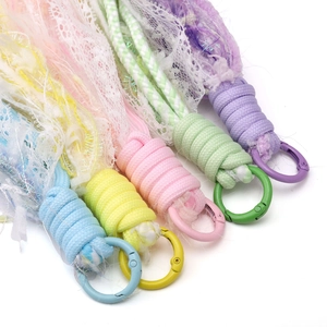 Five colorful polyester lace flower tassel pendants with hooks for DIY jewelry and accessories