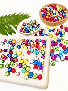 Macro detail of colorful holographic acrylic beads for DIY handmade jewelry bracelets