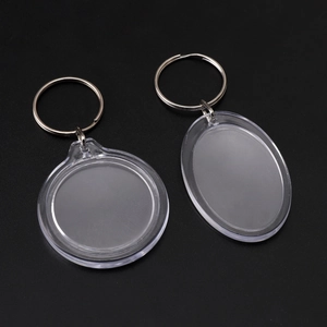 Clear acrylic DIY photo frame keychains in round and oval shapes with silver metal rings