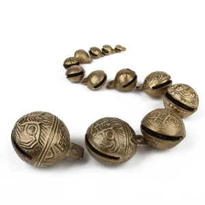 Vintage bronze tiger head bell pendants in various sizes for DIY jewelry crafts