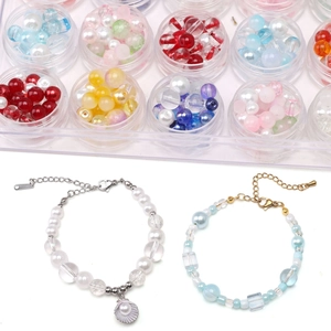 Detailed macro view of DIY handmade bracelets with pearls, colored beads and shell charms