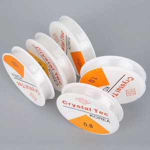 Five spools of clear elastic crystal string for jewelry making in sizes 0.5mm to 1.0mm