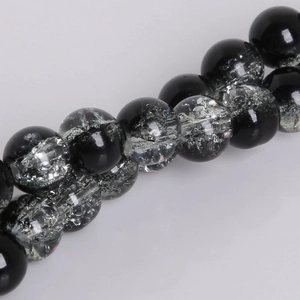 Macro detail of 8mm black and white crackle glass beads for DIY jewelry making