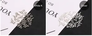 Macro detail of White K and Silver metal screw eye pins for DIY jewelry making