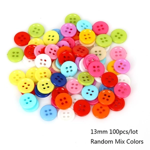 Detailed macro view of 13mm assorted colorful four-hole plastic buttons for DIY sewing