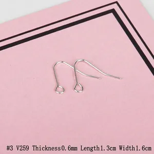 Macro view of silver S925 earring hooks showing 0.6mm wire diameter and size specs