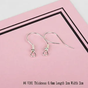 Detail of S925 sterling silver ear hooks measuring 0.6mm thickness and 2cm length for DIY jewelry