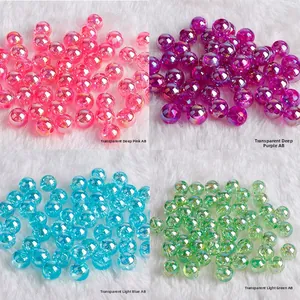 Close-up of DIY acrylic faceted beads with AB rainbow coating in four vibrant colors