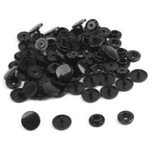 Detailed set of black resin snap buttons showing the four functional components in T5 size