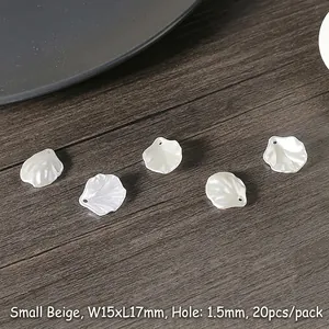Dettaglio di petali di perle ABS 15x17mm per la creazione di forcine e accessori fai-da-te