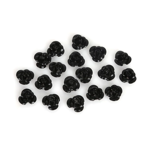 Macro view of 10mm glossy black resin 3D rose flower beads for DIY jewelry making