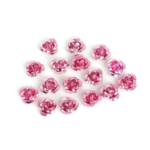Detailed view of bright pink aluminum rose beads for DIY jewelry making and necklaces