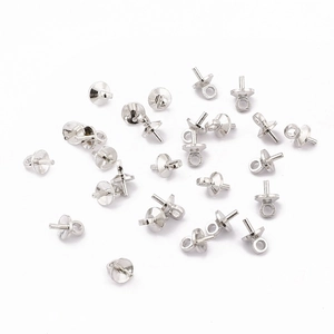 Detailed macro view of silver-plated copper pearl cup bails for DIY jewelry making