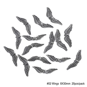 Vue détaillée des perles d'ailes d'ange en alliage argent antique 8x30mm pour bijoux