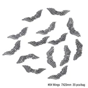 Détail de breloques ailes en alliage argent antique, taille 7x23mm, lot de 20 pour bijoux