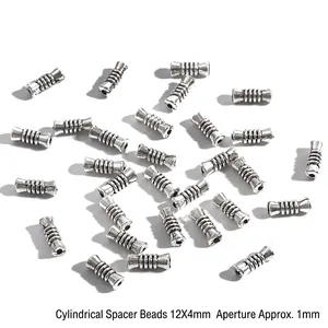 Detail von 12x4mm silbernen Zylinderperlen mit Spiralmuster für DIY Schmuckherstellung