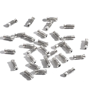 Silver vintage style cylindrical metal spacer beads with spiral texture for DIY jewelry