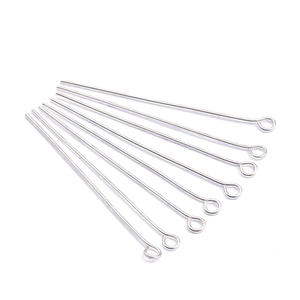 Macro shot of silver metal eye pins for DIY jewelry making and beaded earring accessories