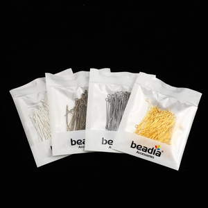 Assorted DIY jewelry headpins in silver, gold, bronze, and black finishes for crafting