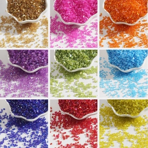 Colorful 2mm glass bugle beads in nine vibrant colors for DIY jewelry making and crafts