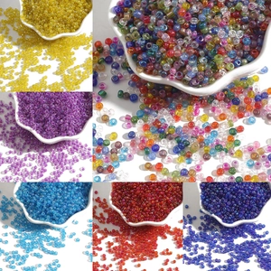 DIY 2-3mm iridescent glass seed beads for jewelry making in colorful ceramic bowls