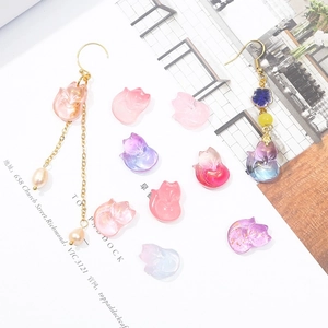 Macro detail of gradient glass fox beads and petals for DIY traditional hair jewelry