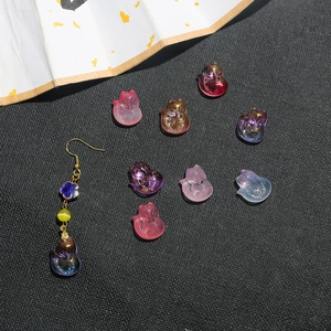 Czech glass fox pendants and floral earrings in gradient pink and purple glass