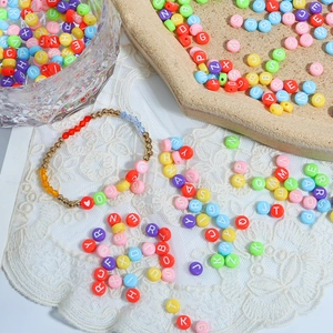 Colorful acrylic alphabet beads with white letters for DIY jewelry making and bracelets